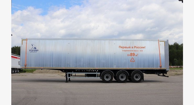 Полуприцеп со сдвижными полами ТОНАР SDP3-89 — боковой вид кузова и осевой группы